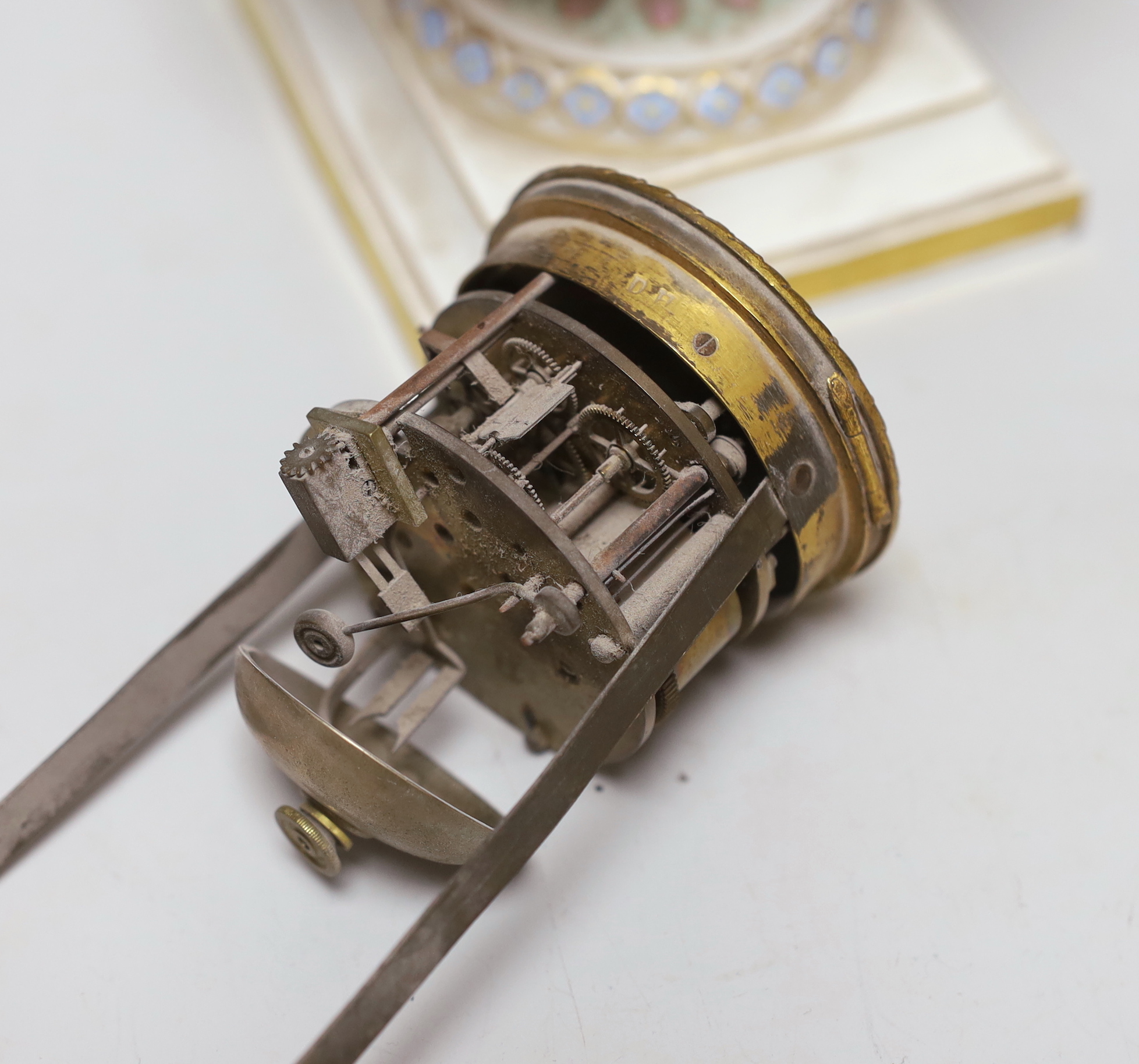 A late 19th century Meissen clock of square form with Watteau scenes and lion mask handles, top missing, 26cm